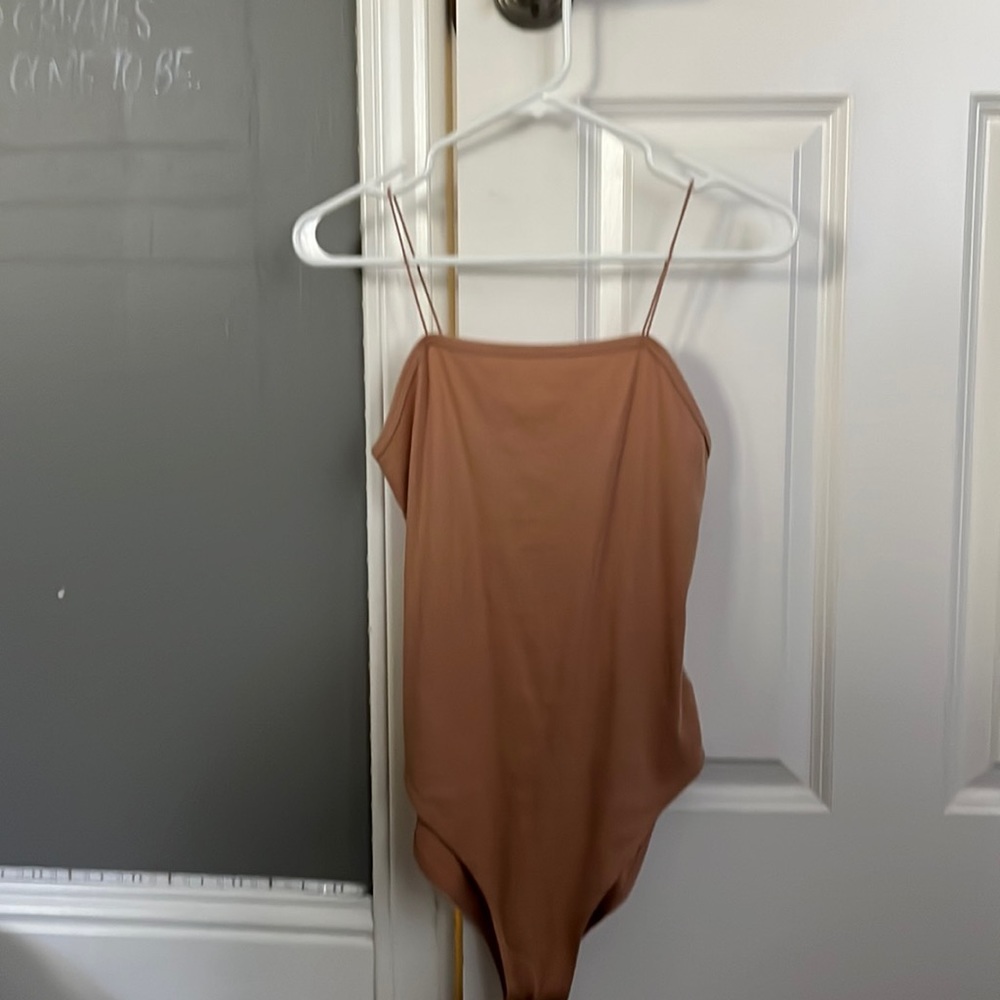 Brown body suit. Wild fable brand. size small but stretchy and comfortable.